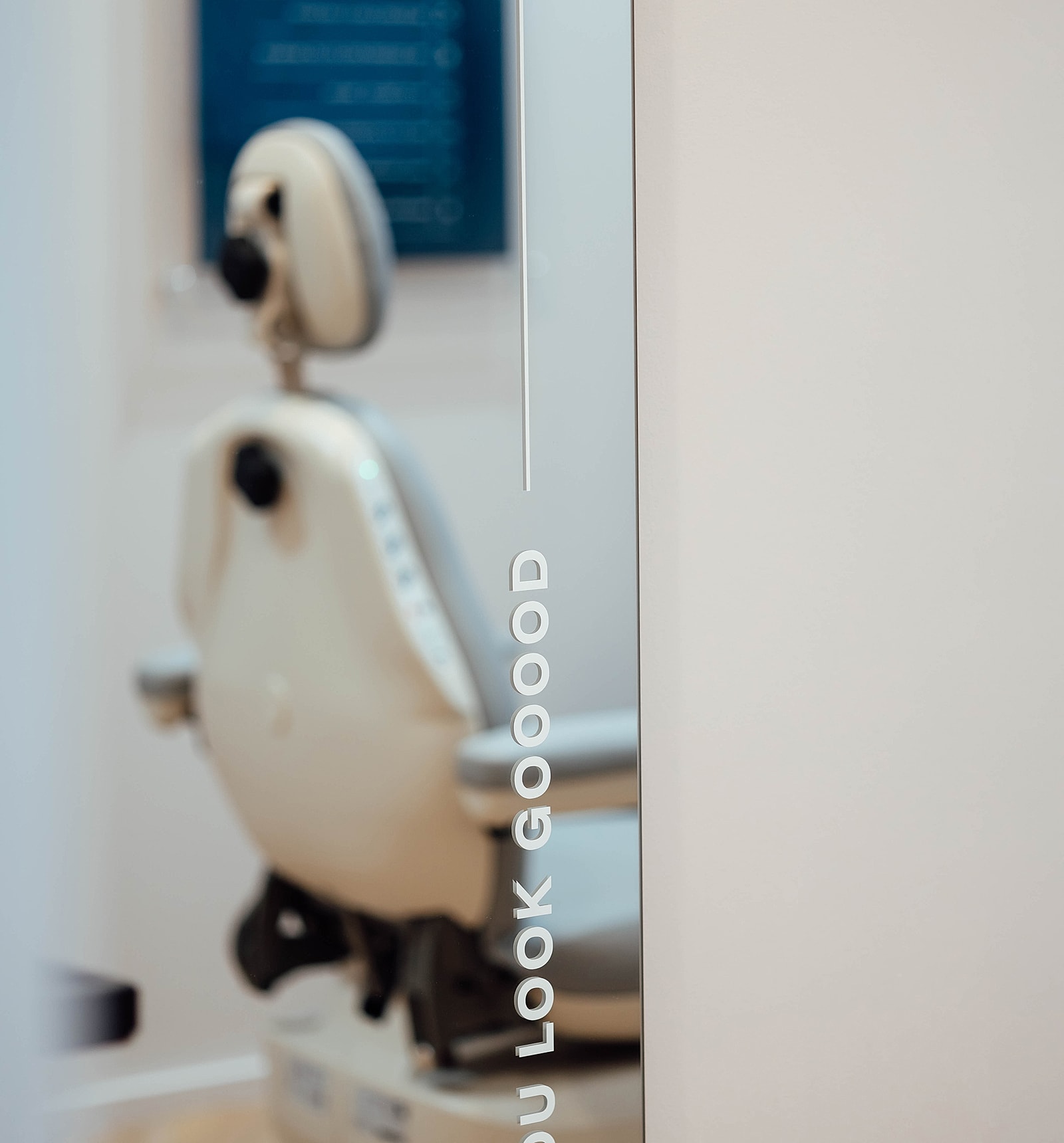 Mirror with motivational message in dental office.